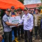 Pj Gubernur NTB, Hassanudin Berikan Bantuan dan Solusi untuk Korban Banjir Bandang di Nanga Wera. (Foto: Lombokini.com/ntbprov.go.id).