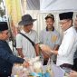Wabup Lombok Timur H. Moh. Edwin Hadiwijaya meninjau stand UMKM di Expo Muharram, Lapangan Nasional Selong, Jumat 27 Juni 2025. (Foto: Lombokini.com/Izzul Khairi).