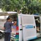 Mobil layanan Samsat keliling memudahkan warga mengurus pajak kendaraan dalam program keringanan yang berhasil mendongkrak penerimaan hingga 15 persen. (Foto: Lombokini.com).

