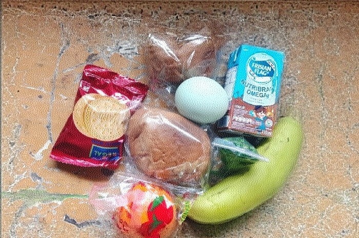 Menu Satuan Pelayanan Pemenuhan Gizi (SPPG) MBG Al Faqih untuk dua hari di Desa Anjani, Kecamatan Suralaga, tampak dalam foto ini. (Foto: Lombokini.com).