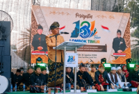 Bupati Lombok Timur, H. Haerul Warisin, membacakan sambutan pada acara puncak peringatan Hari Jadi Lombok Timur, Senin, 31 Agustus 2026 di Lapangan Tugu Selong. (Foto: Lombokini.com)
