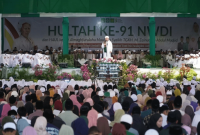 Puluhan ribu jamaah mengikuti puncak Hultah NWDI ke-91 dan Haul ke-29 Al-Maghfurlah Maulana Syaikh TGKH. Muhammad Zainuddin Abdul Madjid dengan memadati GOR dan Lapangan Utama YPH PPD NWDI Pancor, Lombok Timur, NTB, Ahad (13/9/2026). (Foto: Lombokini.com)